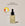 A clear glass bottle with a dropper containing Brightening 2% Vitamin C & Ferulic Acid Serum next to a circle displaying old packaging and text calling out: New look , same proven formula